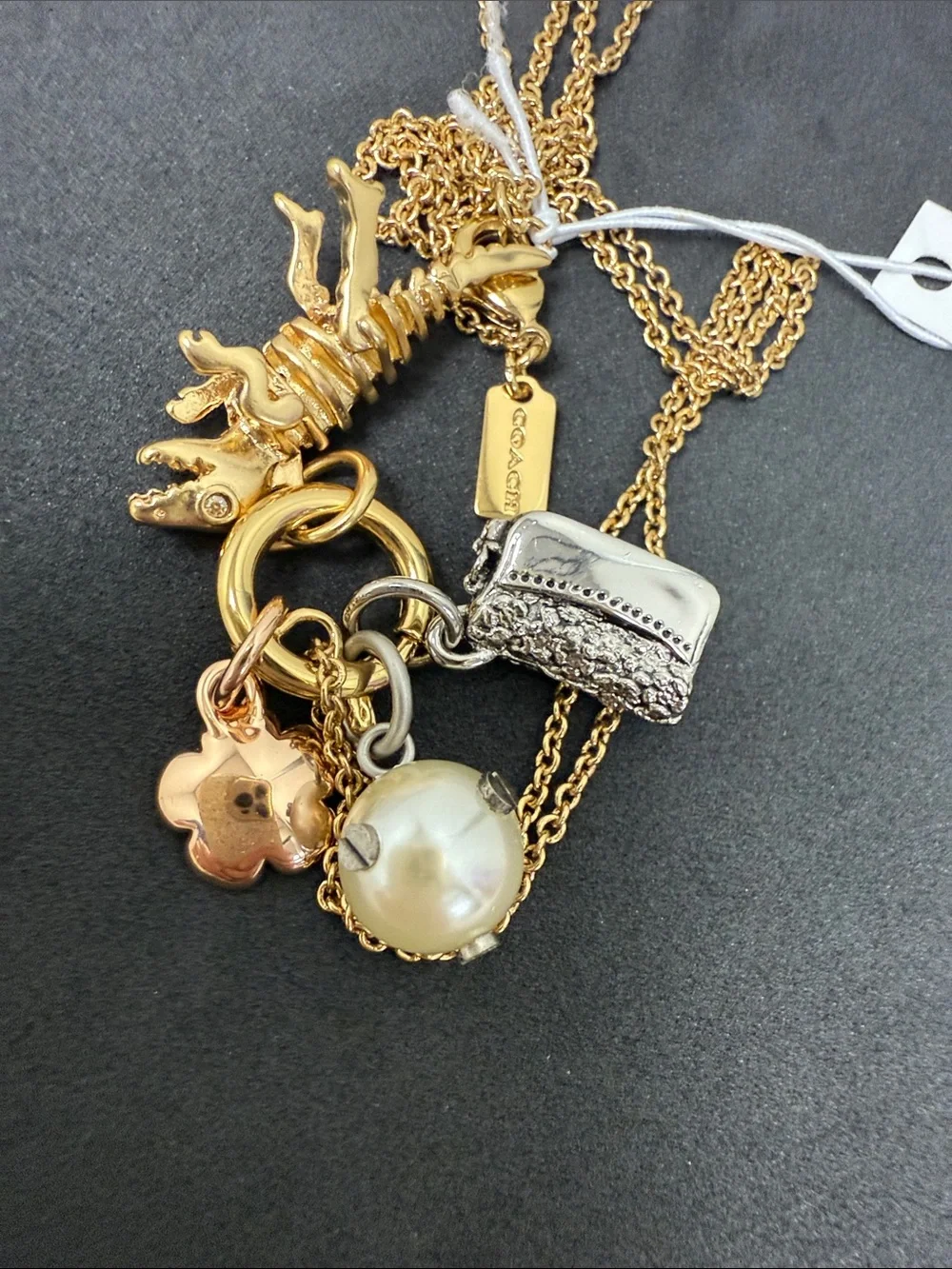 Rare COACH Rexy Gold-Tone Multi-Charm Necklace with Rexy, Pearl & Floral Charms